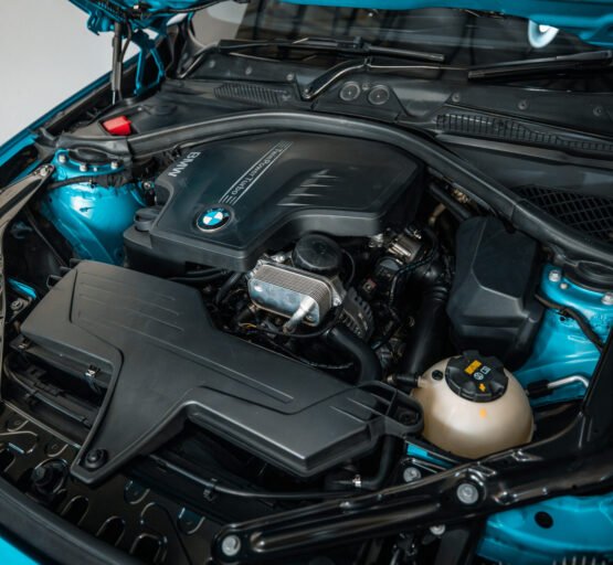 BMW M235i xDrive engine, exemplifying high-performance engineering and luxury detailing services in Johannesburg.